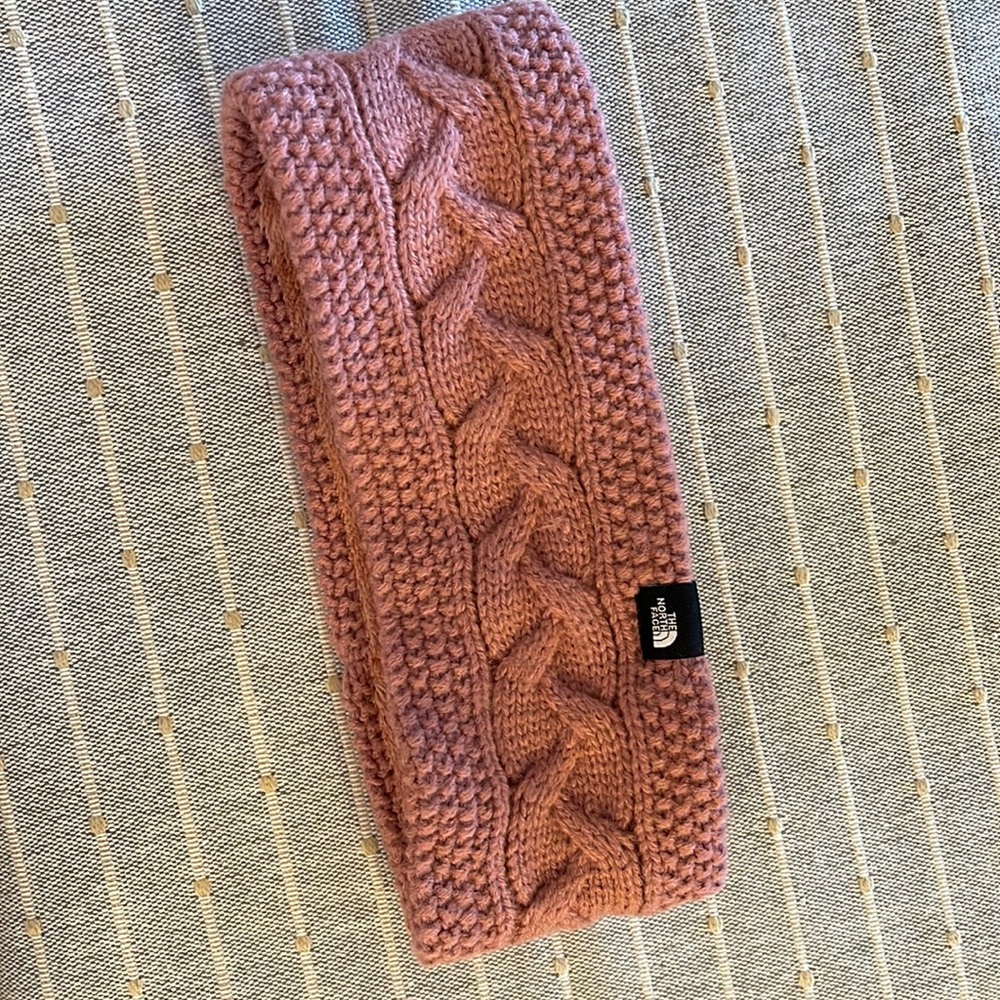 NorthFace headband, warm fuzzy on the inside, Knit on the outside. One size.